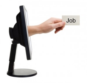 Computer screen and hand with card, isolated on white background