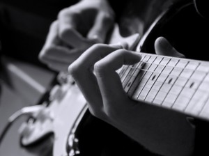 6. Playing Guitar